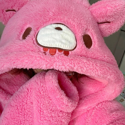 Close-up of the plush pink Gloomy Bear hood featuring 3D ears and embroidered face with red drip details 