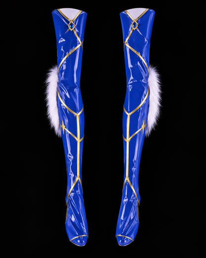 Pair of blue Altria Pendragon leg sleeves with gold geometric trim and white faux-fur side panels
