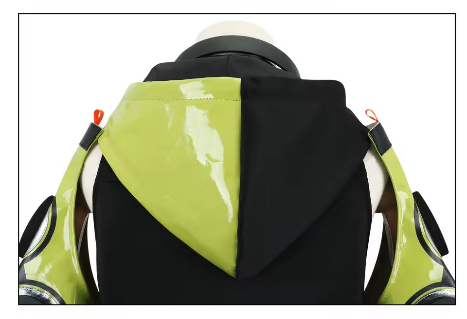 Close-up of a green and black backpack with reflective material.