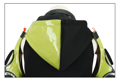 Close-up of a green and black backpack with reflective material.