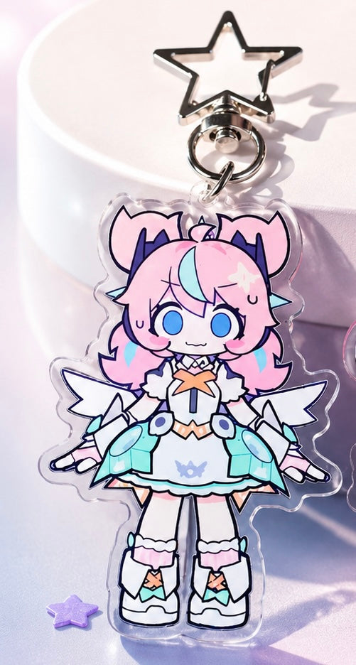 Anime character keychain with pink hair and star accessories on a light background