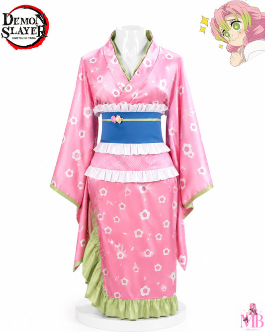 Demon Slayer Mitsuri Kanroji cosplay costume front view featuring pink floral kimono with obi belt on MBCosplay signature mannequin.