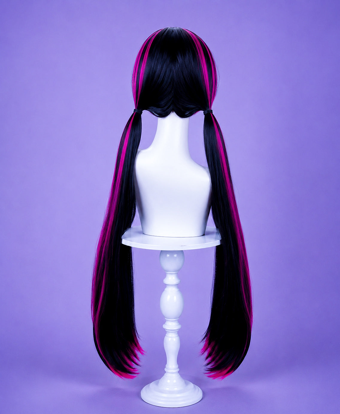 Back view of the Draculaura cosplay wig with long black and pink twin tails displayed on a white mannequin head.