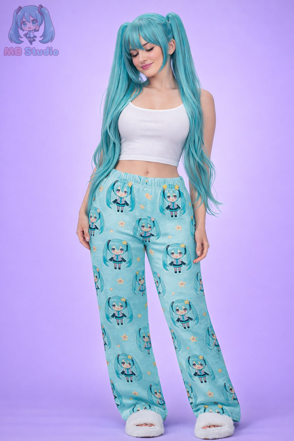 Person wearing a matching outfit with pajama pants and top featuring a character design on a purple background.