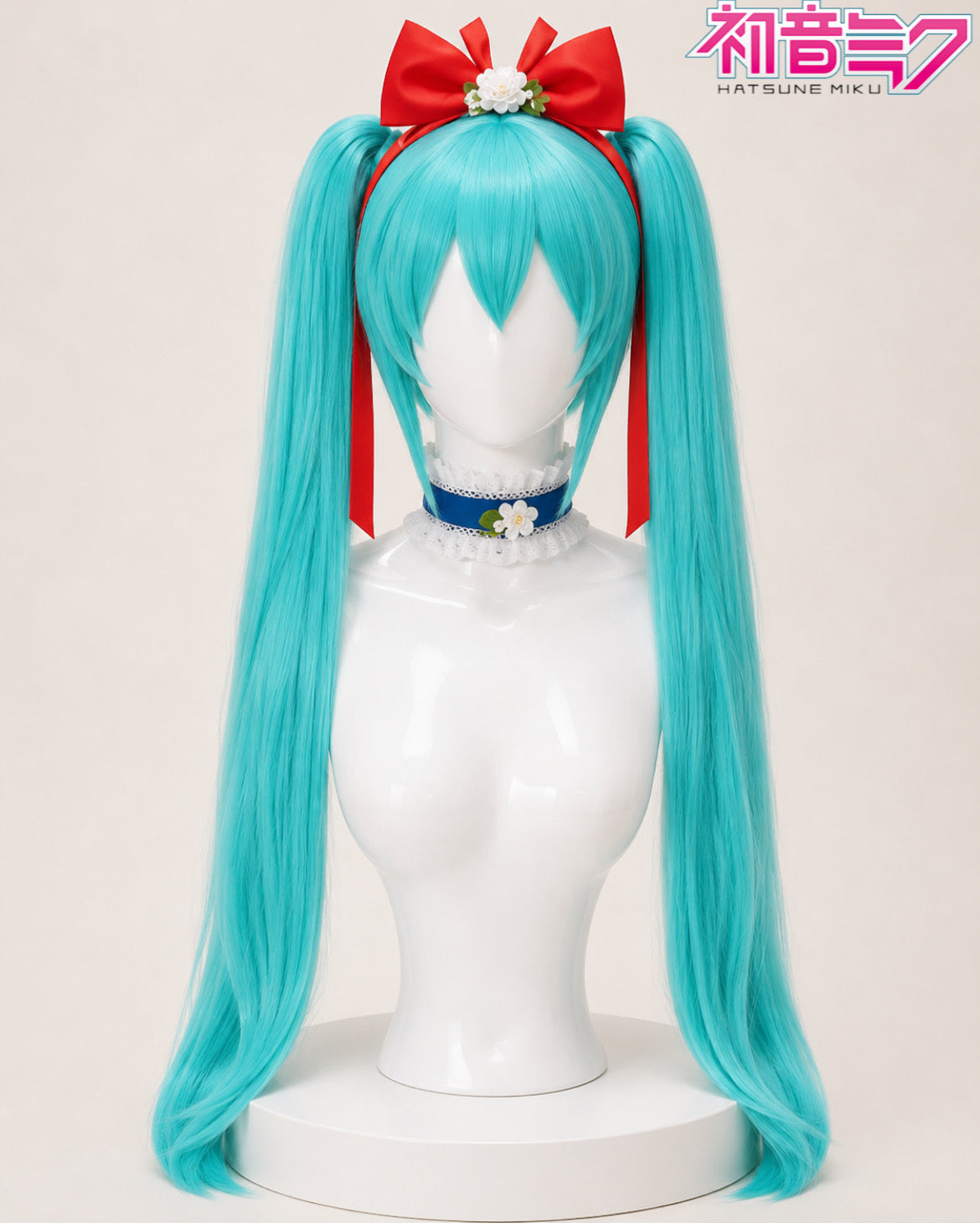 Hatsune Miku Snow White Princess cosplay dress and turquoise twin-tail character wig displayed separately