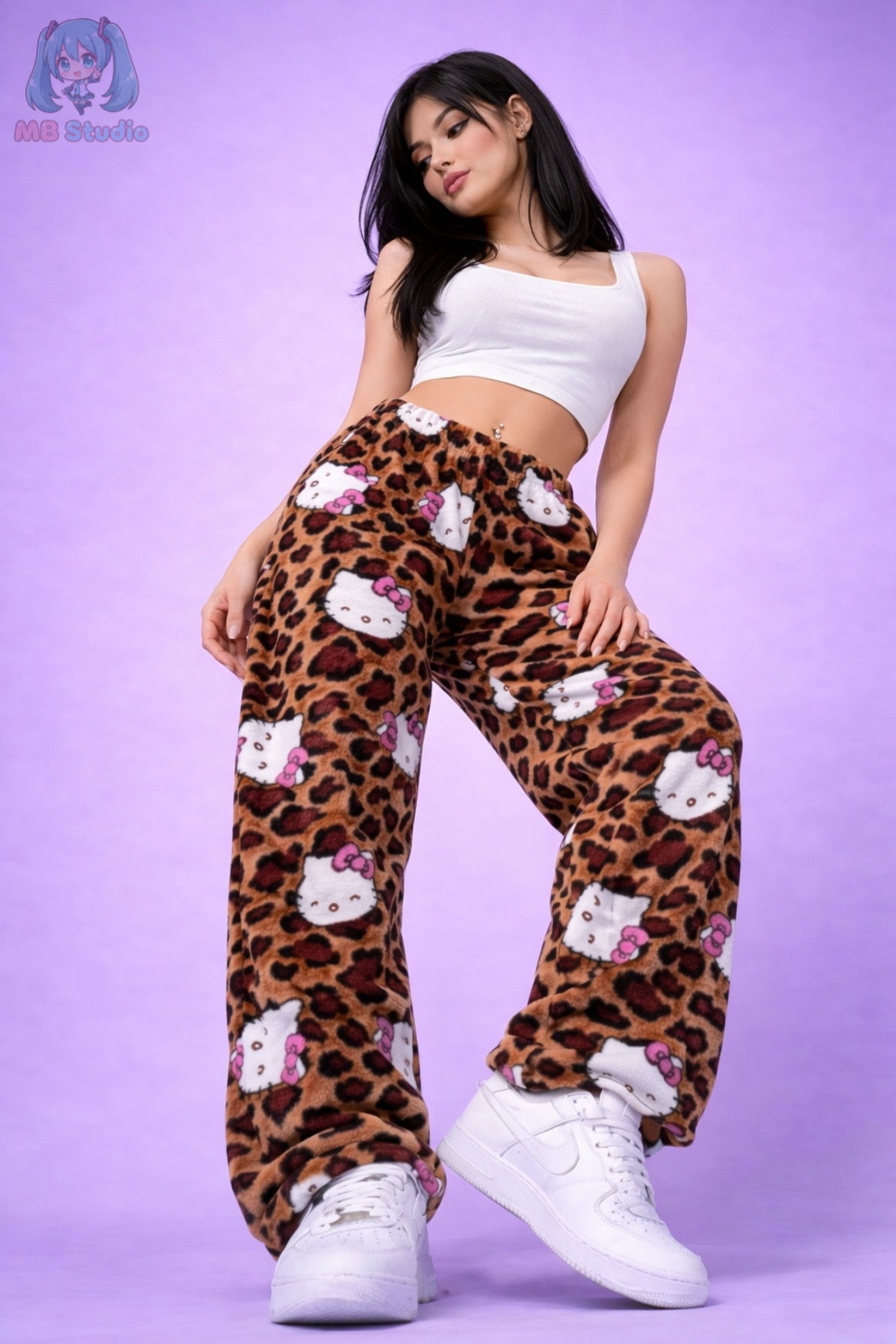 Front view of Hello Kitty leopard print pyjama bottoms with elastic waistband and all over character print, women’s soft fleece lounge pants studio image