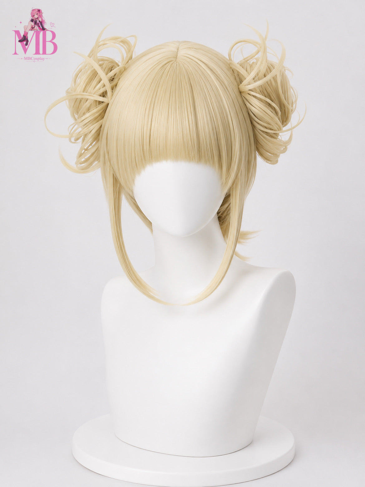 Himiko Toga cosplay wig from My Hero Academia featuring platinum blonde messy twin buns, blunt anime bangs and long face-framing strands displayed on the MBCosplay signature white mannequin bust with premium commercial studio lighting, perfect for anime cosplay, conventions and photoshoots.