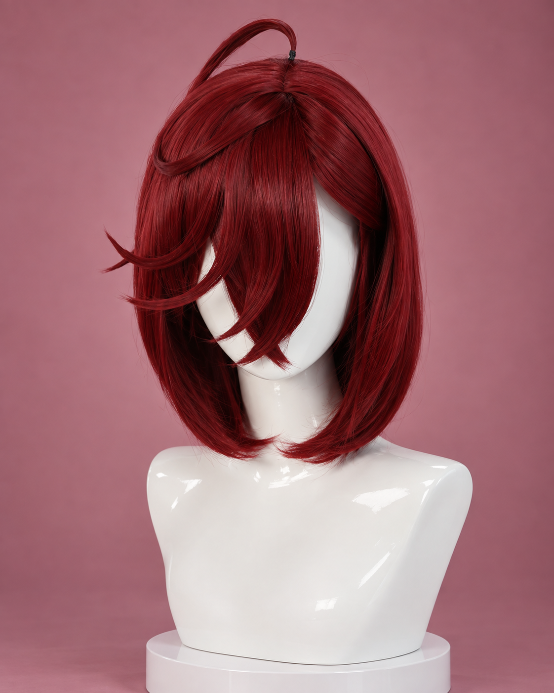 Front view of the short red Momo Ayase cosplay wig with layered fringe and antenna strand