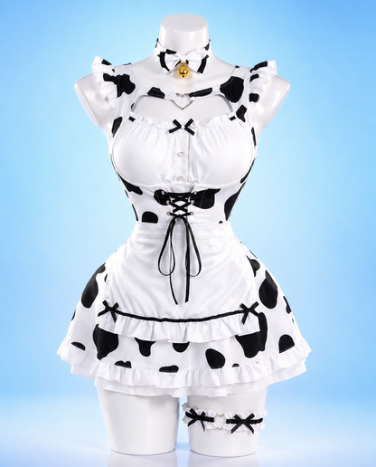 MooBelle Sweetheart Kawaii Cow Print Lolita Dress in black and white cow print displayed on a mannequin, featuring ruffle trim, lace-up bodice, bell choker and kawaii Y2K fairy aesthetic.