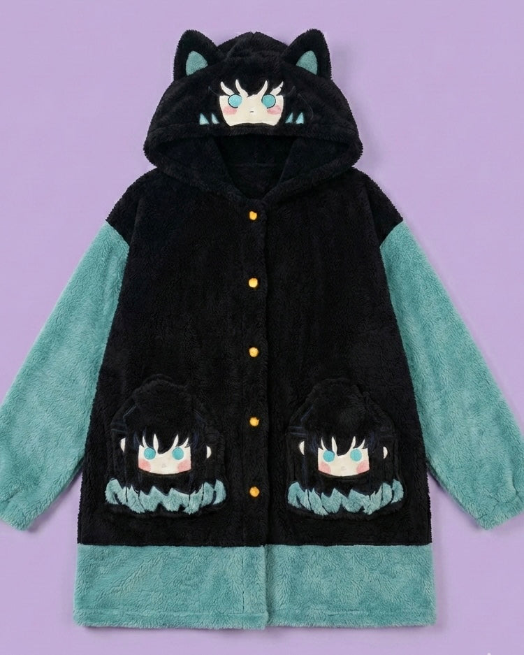 Black and green hooded jacket with cat face designs on a purple background