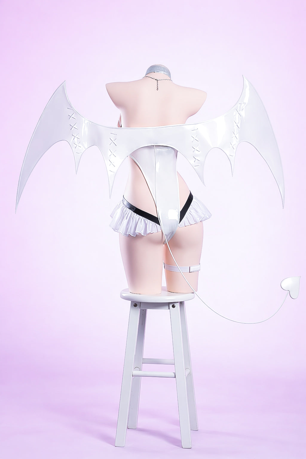 Nikke Blanc cosplay costume back view with wings and tail accessory