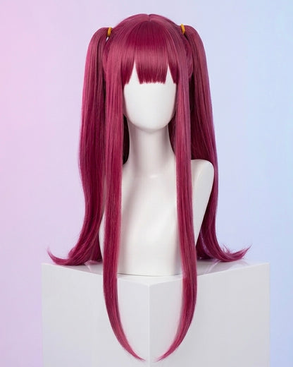 Pink wig with twin tails on a mannequin head against a light purple background