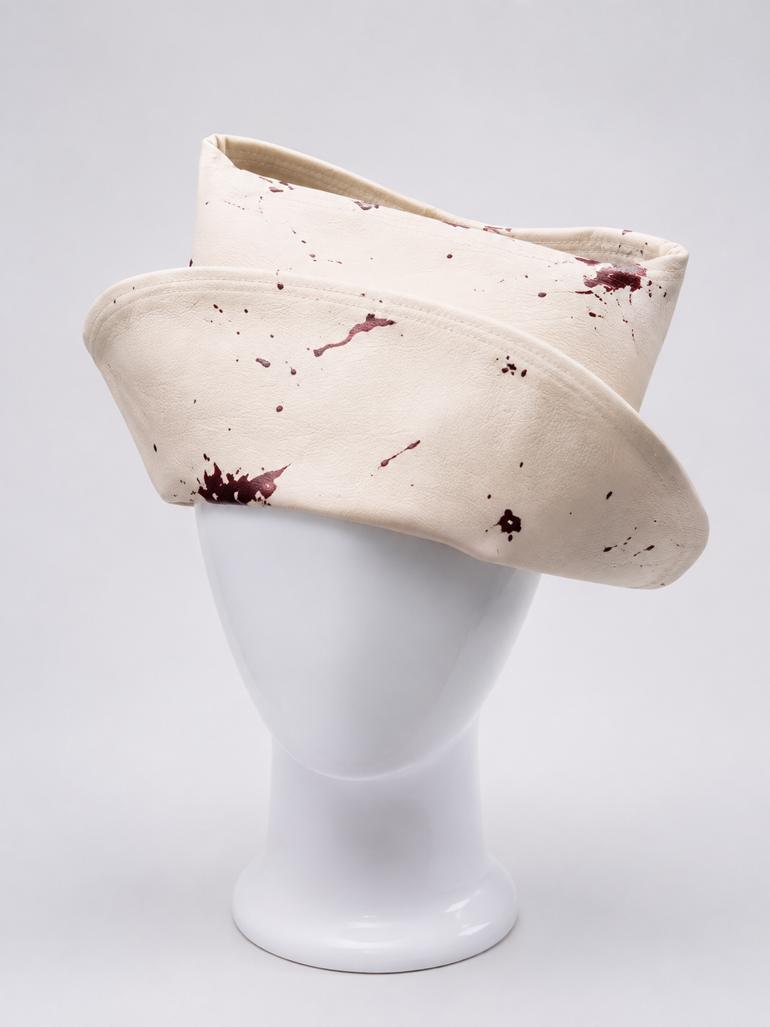 Silent Hill 2 Bubble Head Nurse cosplay hat in cream with distressed blood-splatter detailing