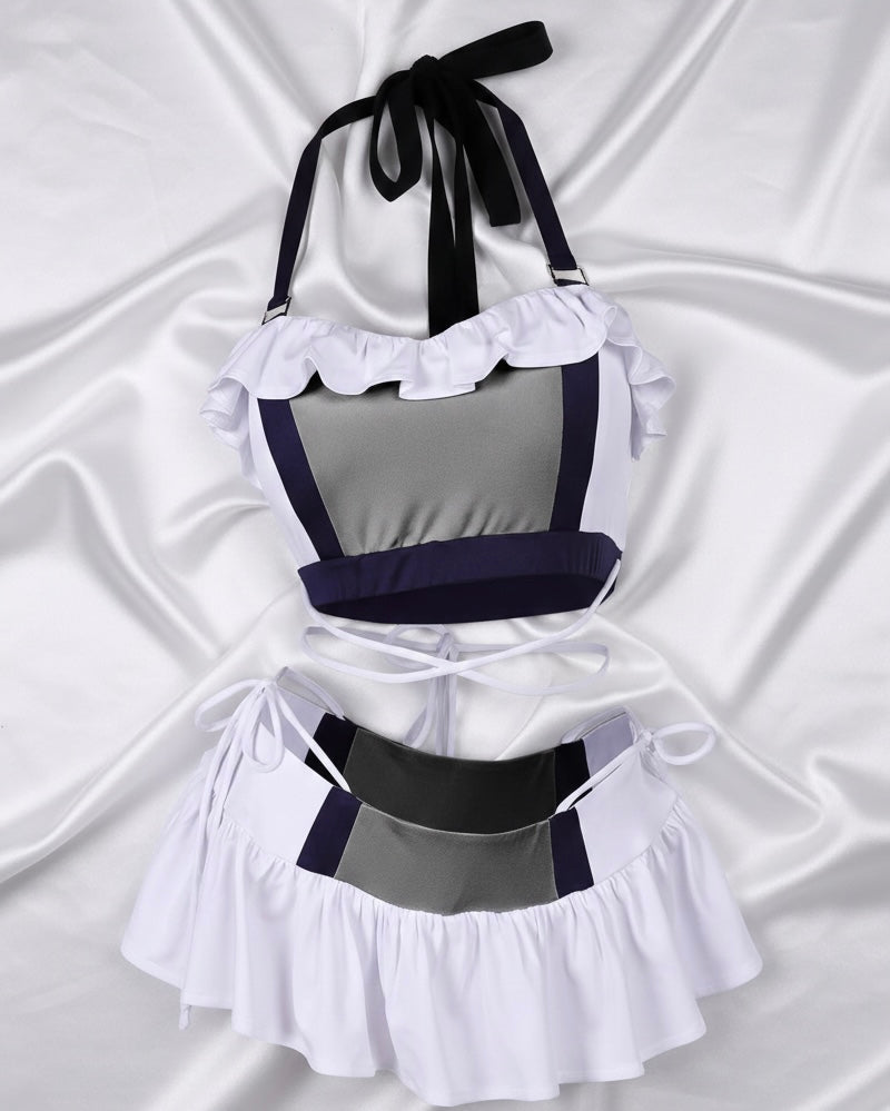 Tifa Lockhart cosplay swimsuit set displayed on invisible mannequin with silk draped background