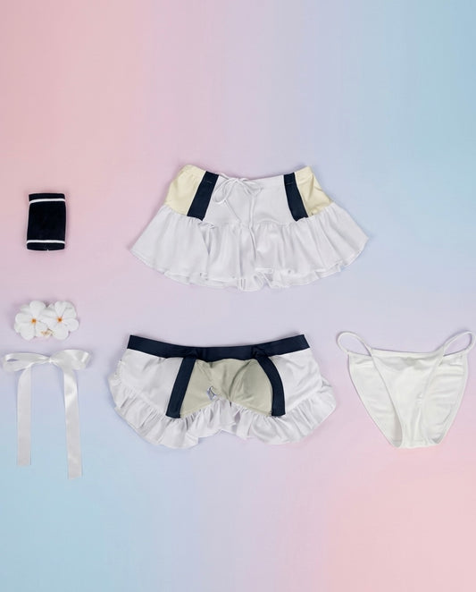 Set of ruffled underwear with decorative elements on a gradient background