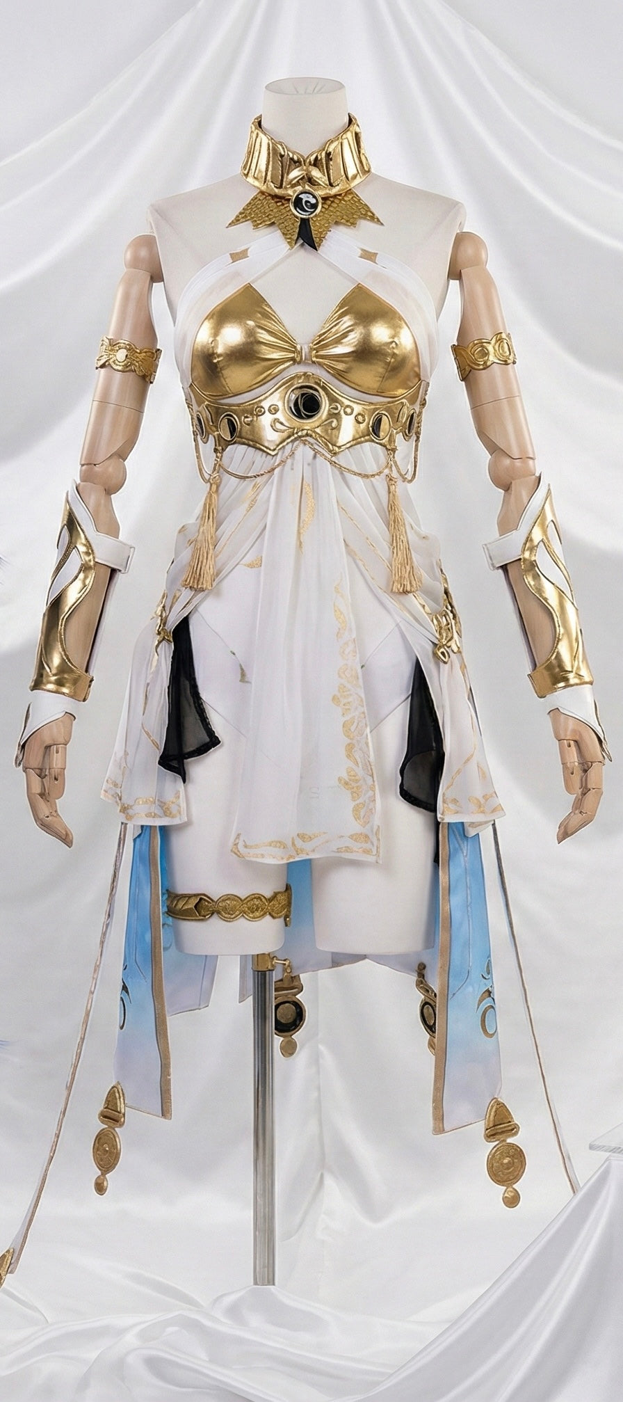 Front view of the Wuthering Waves IUNO/LUNO cosplay dress on a mannequin, featuring a white and metallic gold halter top, ornate collar, and draped white skirt