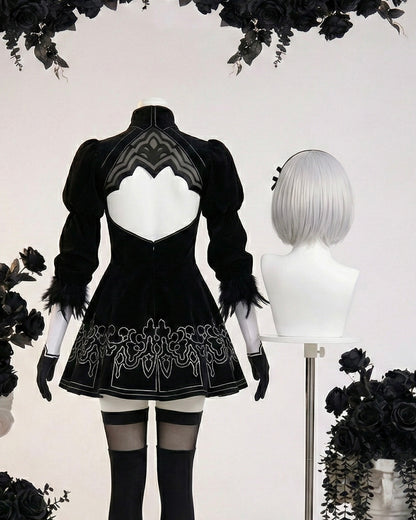 Rear view of 2B dress showing the heart-shaped open back and silver embroidery
